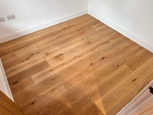 wooden laminate flooring fitted in new build property
