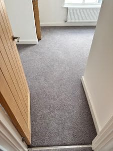 grey carpet fitted in new build property