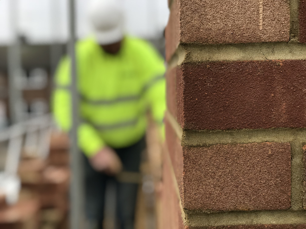Builder at work Bricklaying on a home extension or new build house